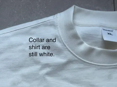 Solflare tee collar close-up — in spec